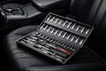Close-up Tool Set on Black Luxury Car Seat